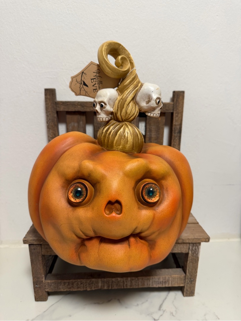 Hallow's Eve Eyeball Pumpkin Figurine with Skulls Stem Decor